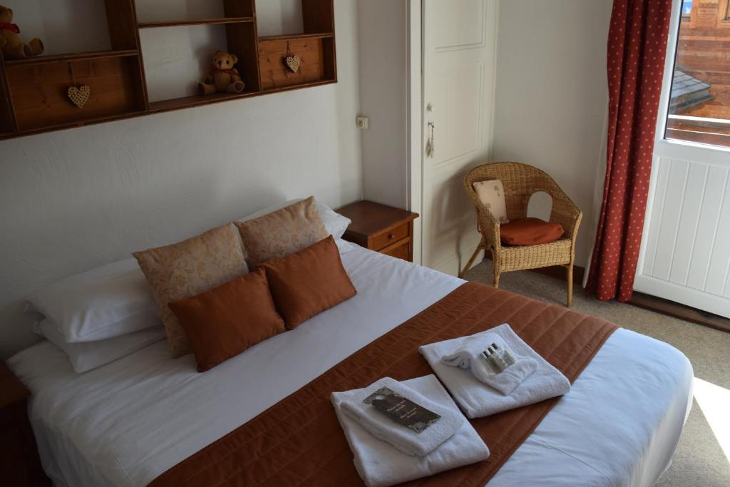 Postel nebo postele na pokoji v ubytování Hotel Sylvana