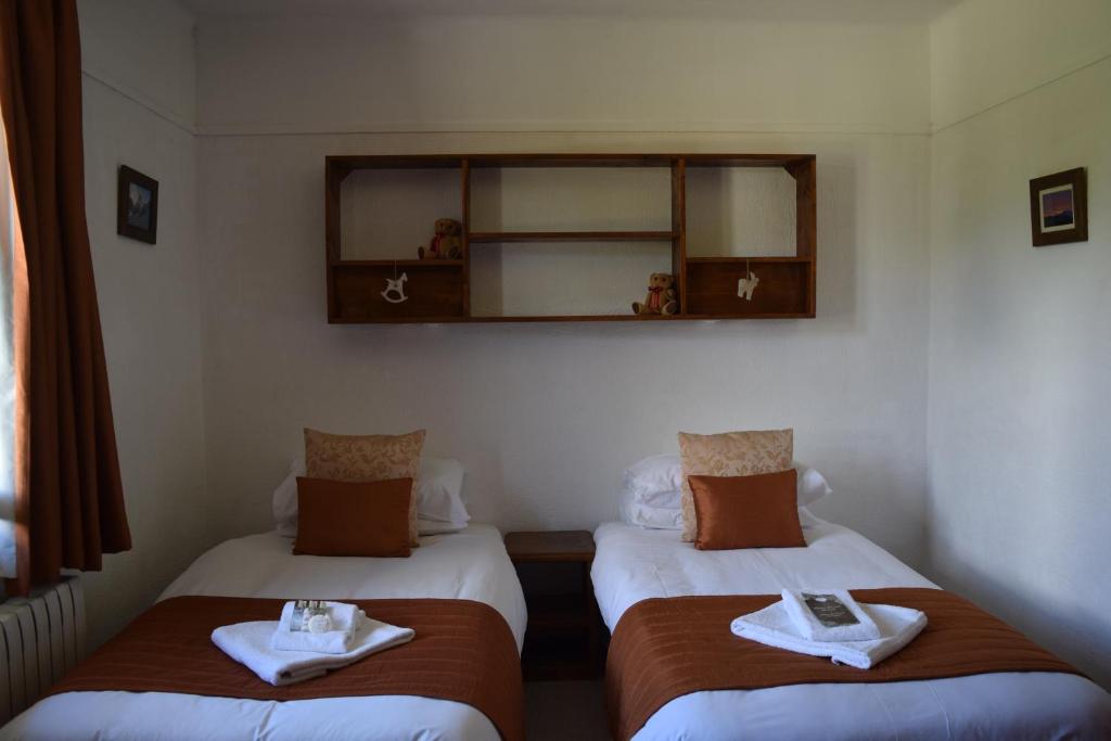 Postel nebo postele na pokoji v ubytování Hotel Sylvana