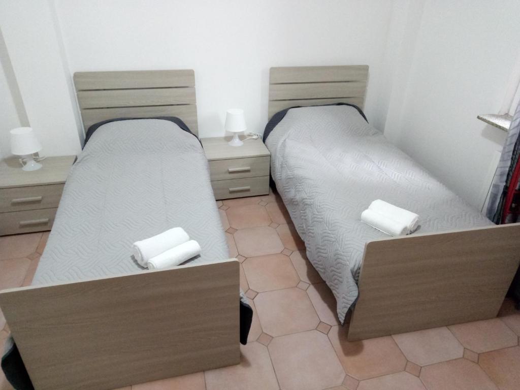 Postel nebo postele na pokoji v ubytování B&B MIke