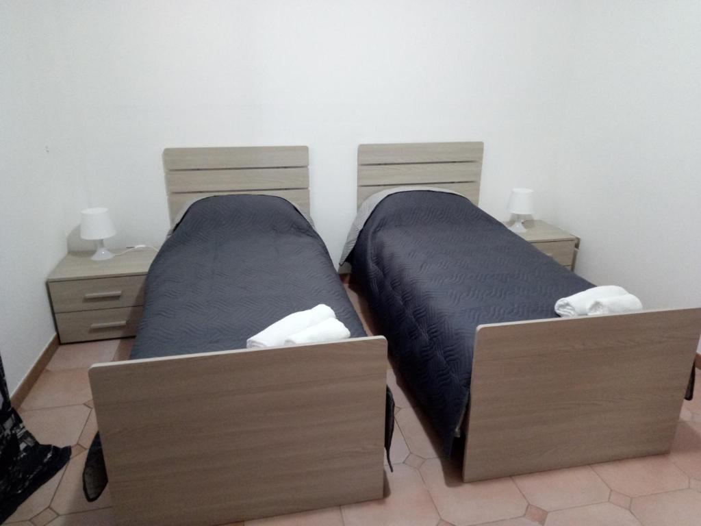Postel nebo postele na pokoji v ubytování B&B MIke