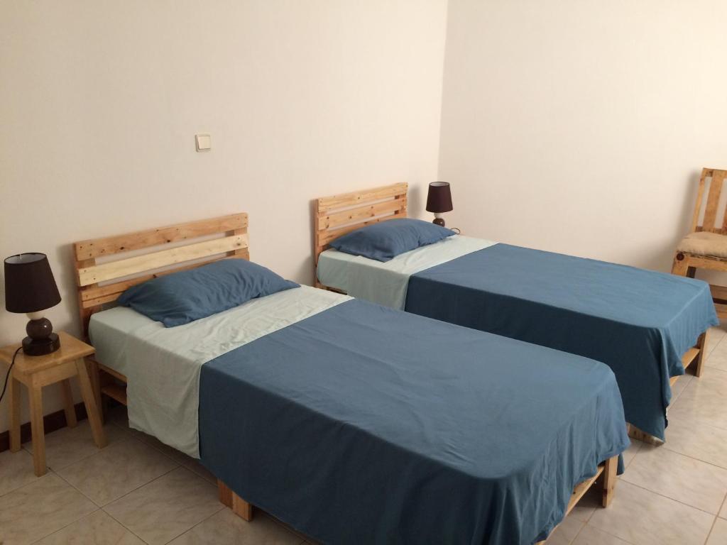 Postel nebo postele na pokoji v ubytování Vannilla Residencial
