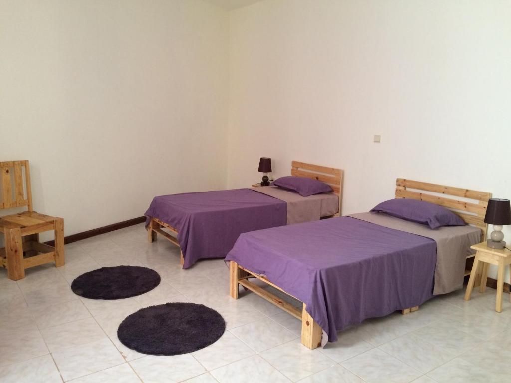 Postel nebo postele na pokoji v ubytování Vannilla Residencial