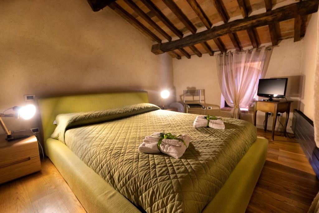 Un pat sau paturi într-o cameră la Larocchettina