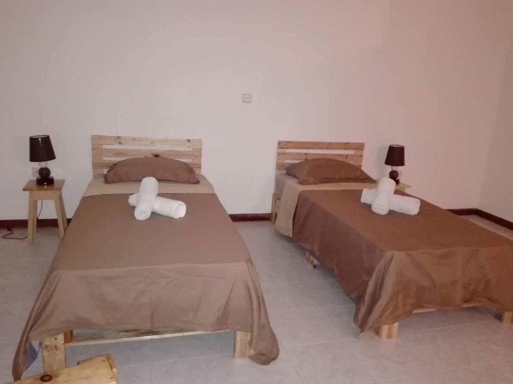 Postel nebo postele na pokoji v ubytování Vannilla Residencial