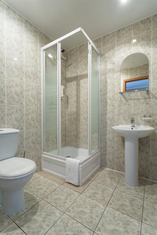 Koupelna v ubytování Kompleks Hotelowy Logos