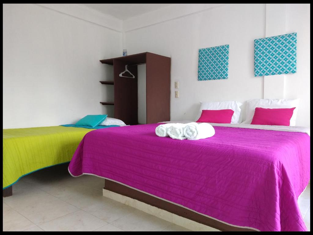 Postel nebo postele na pokoji v ubytování Hotel España