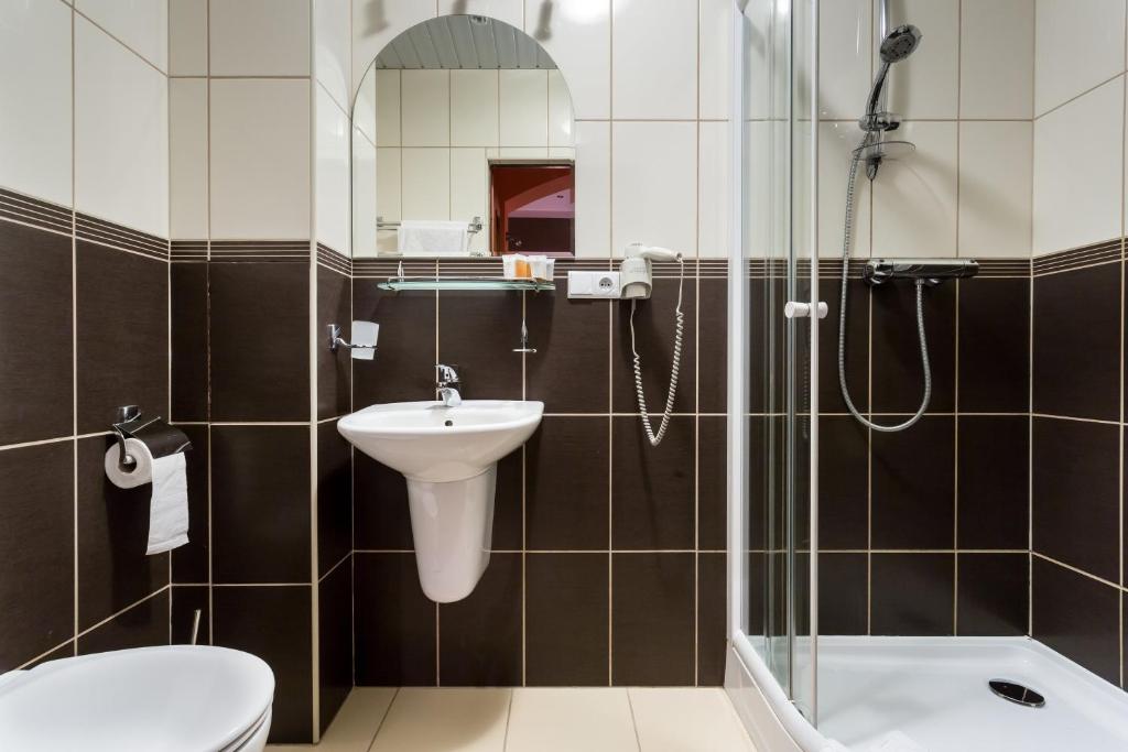 Koupelna v ubytování Kompleks Hotelowy Logos