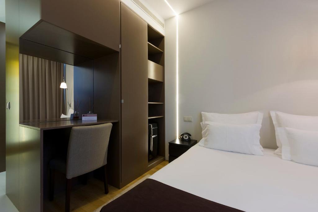 Postel nebo postele na pokoji v ubytování Hotel Fabrica do Chocolate