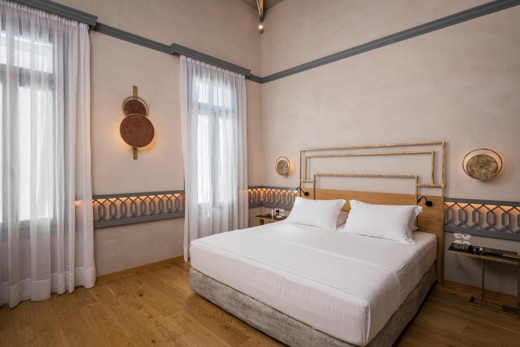 Postel nebo postele na pokoji v ubytování Scala de Faro