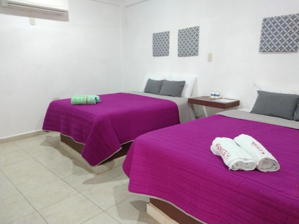 Postel nebo postele na pokoji v ubytování Hotel España