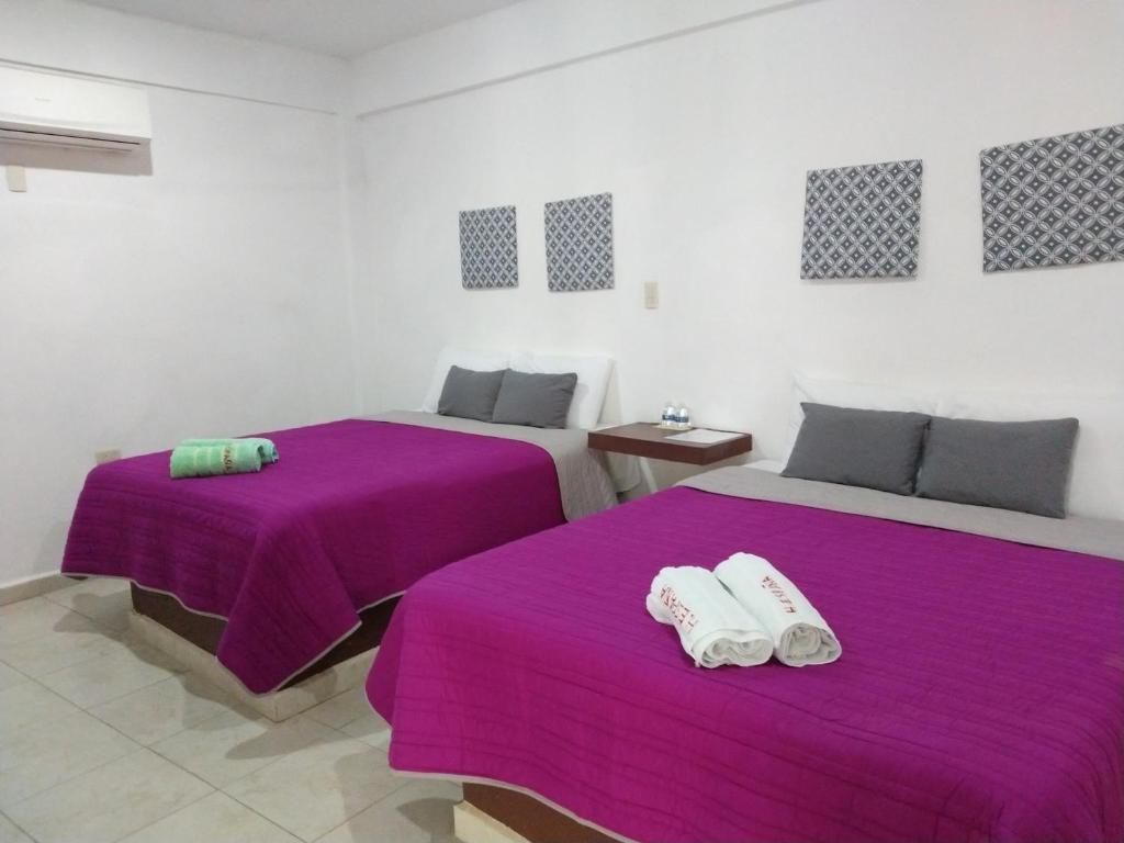 Postel nebo postele na pokoji v ubytování Hotel España