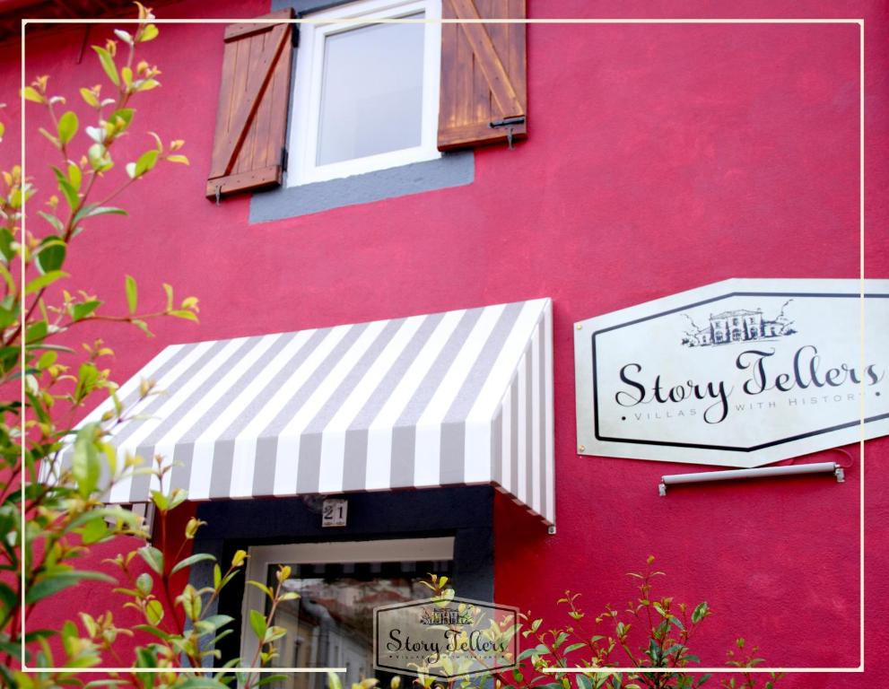 Certifikát, hodnocení, plakát nebo jiný dokument vystavený v ubytování Storytellers Villas