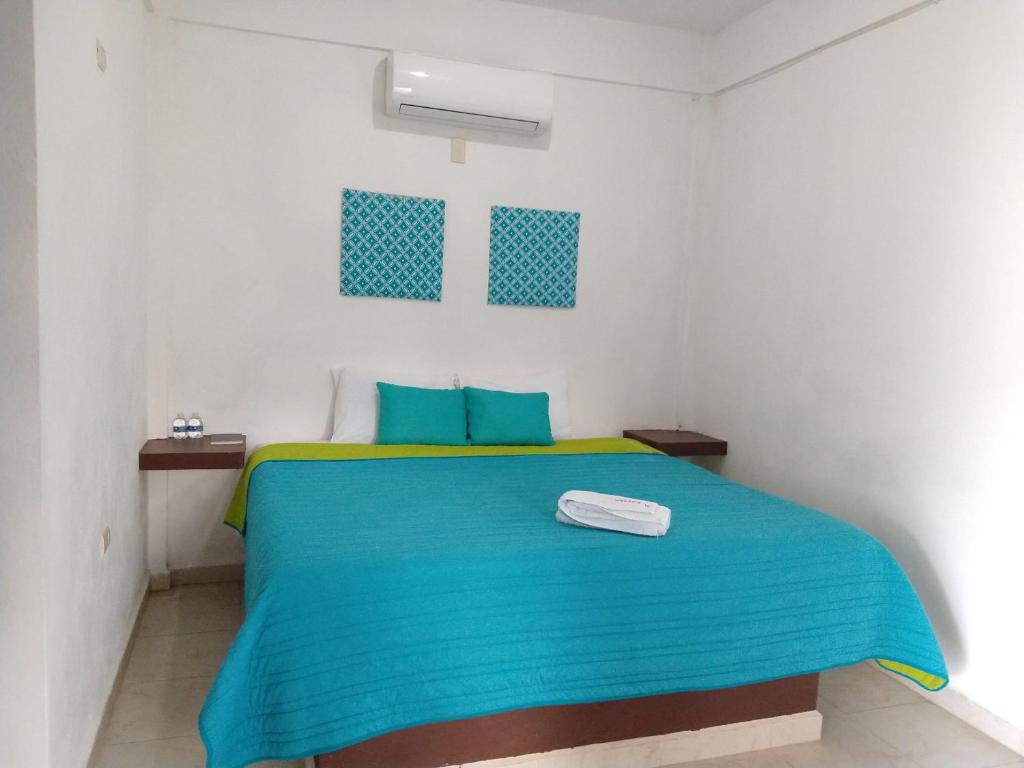 Postel nebo postele na pokoji v ubytování Hotel España