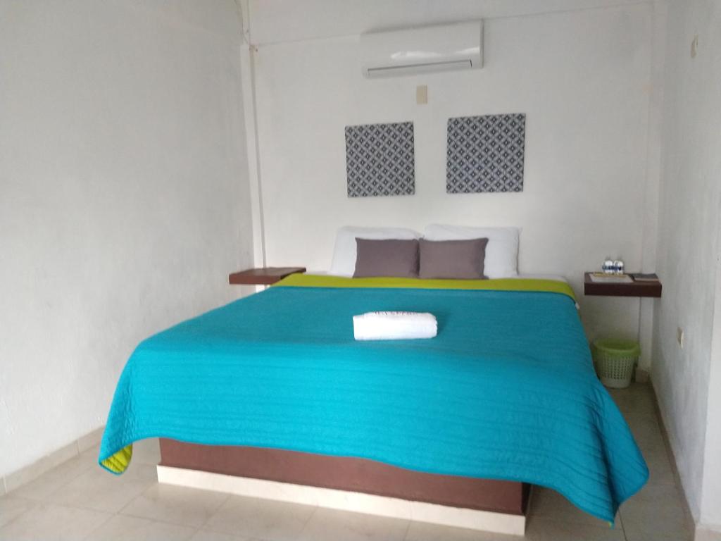 Postel nebo postele na pokoji v ubytování Hotel España