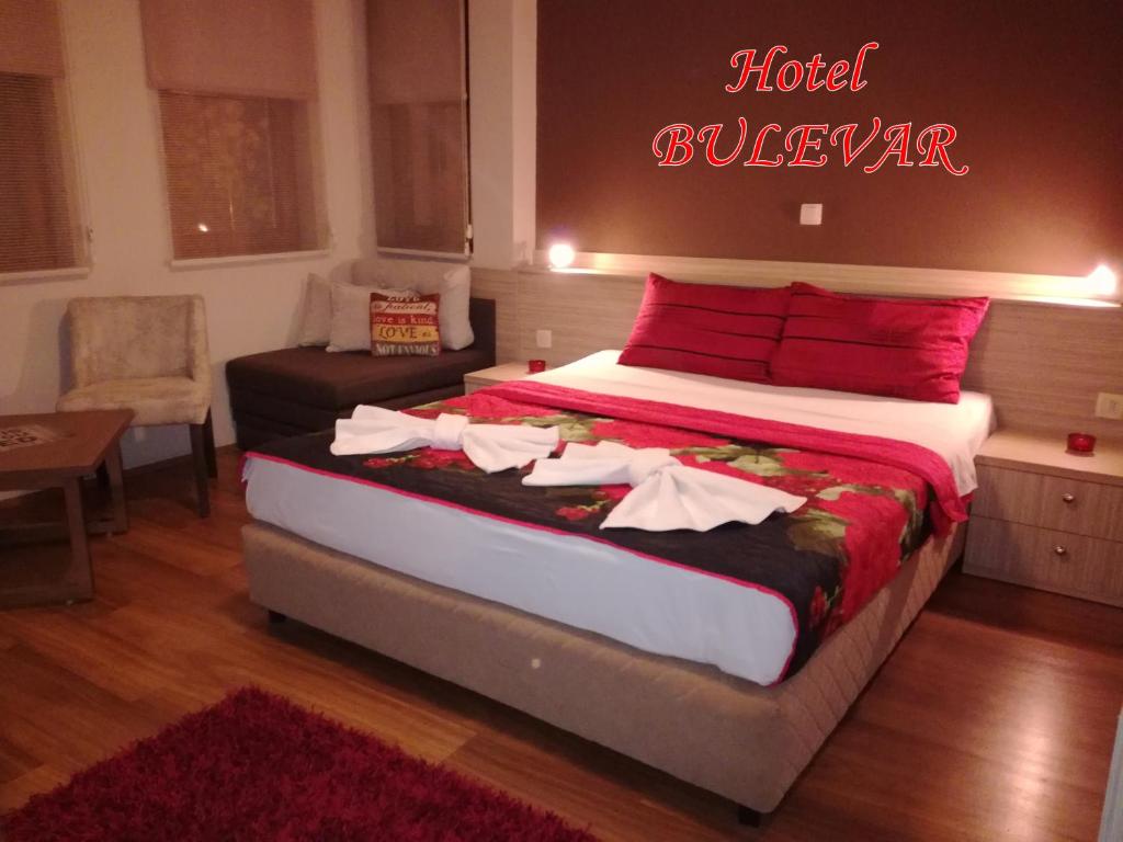 Postel nebo postele na pokoji v ubytování Hotel Bulevar
