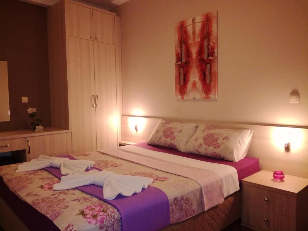 Postel nebo postele na pokoji v ubytování Hotel Bulevar