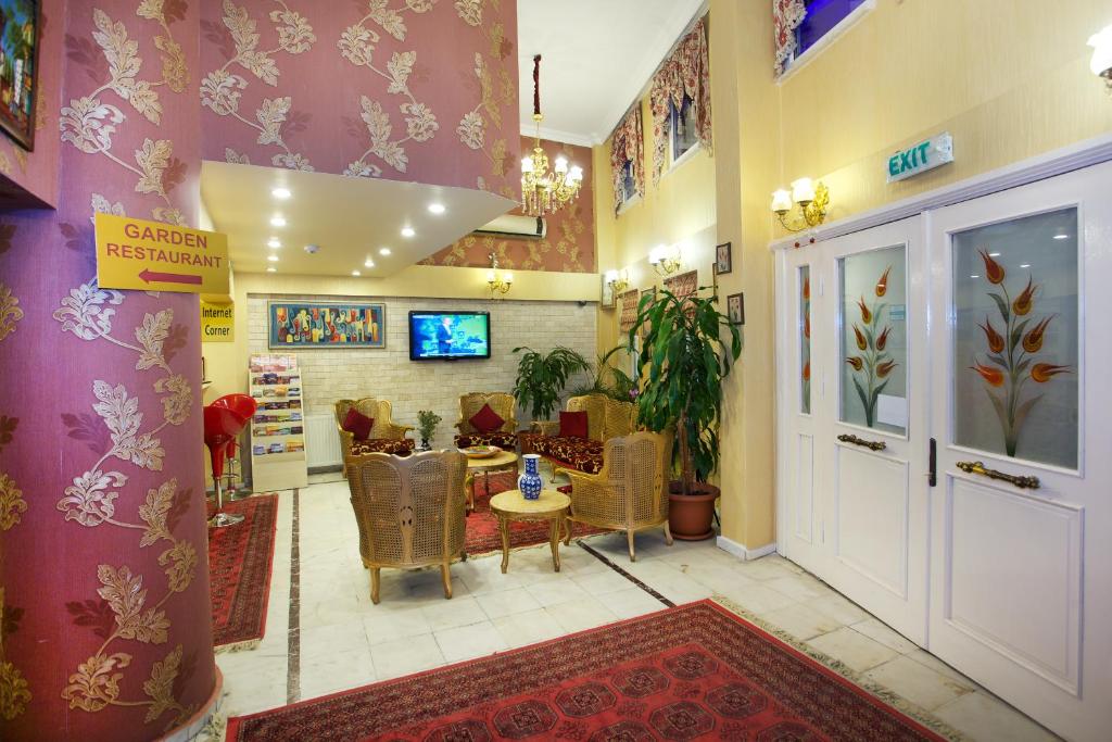 TV a/nebo společenská místnost v ubytování Divas Hotel