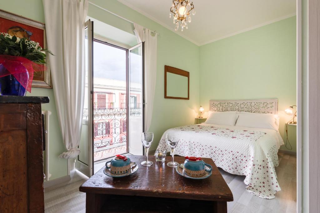 Postel nebo postele na pokoji v ubytování A Roman Tale B&B