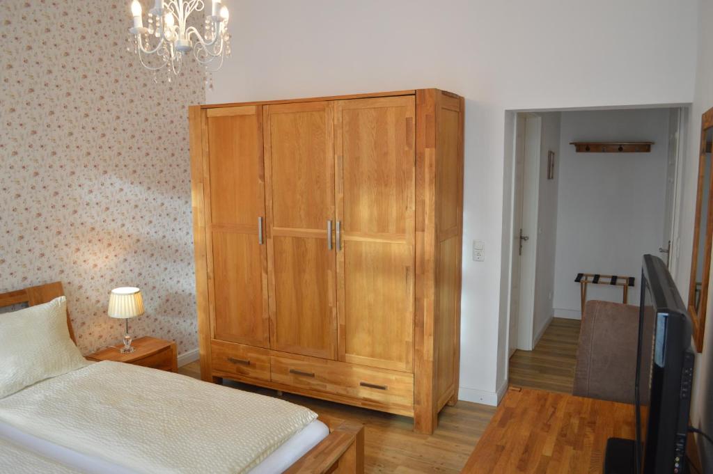 Postel nebo postele na pokoji v ubytování Altstadtpension Hameln