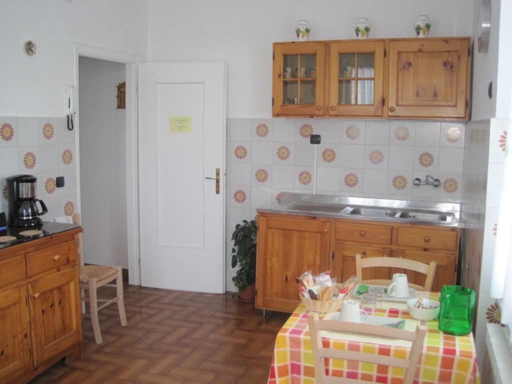 Kuchyň nebo kuchyňský kout v ubytování B&B Fattore