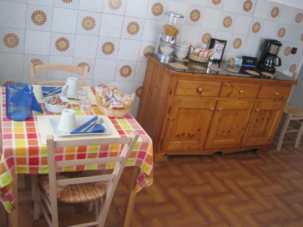 Kuchyň nebo kuchyňský kout v ubytování B&B Fattore