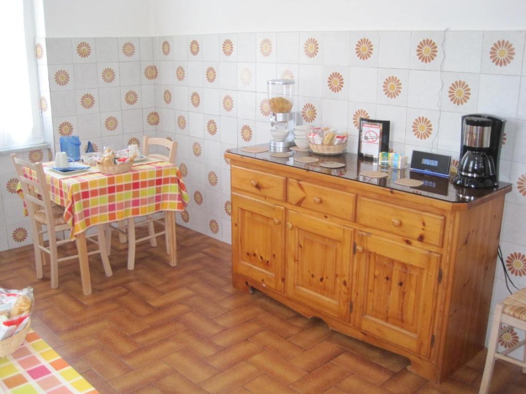 Kuchyň nebo kuchyňský kout v ubytování B&B Fattore