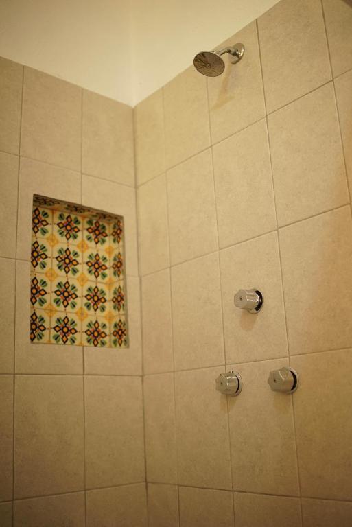 Koupelna v ubytování Hostal Tlaquepaque