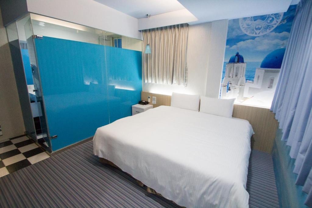 Postel nebo postele na pokoji v ubytování Morwing Hotel - Ocean