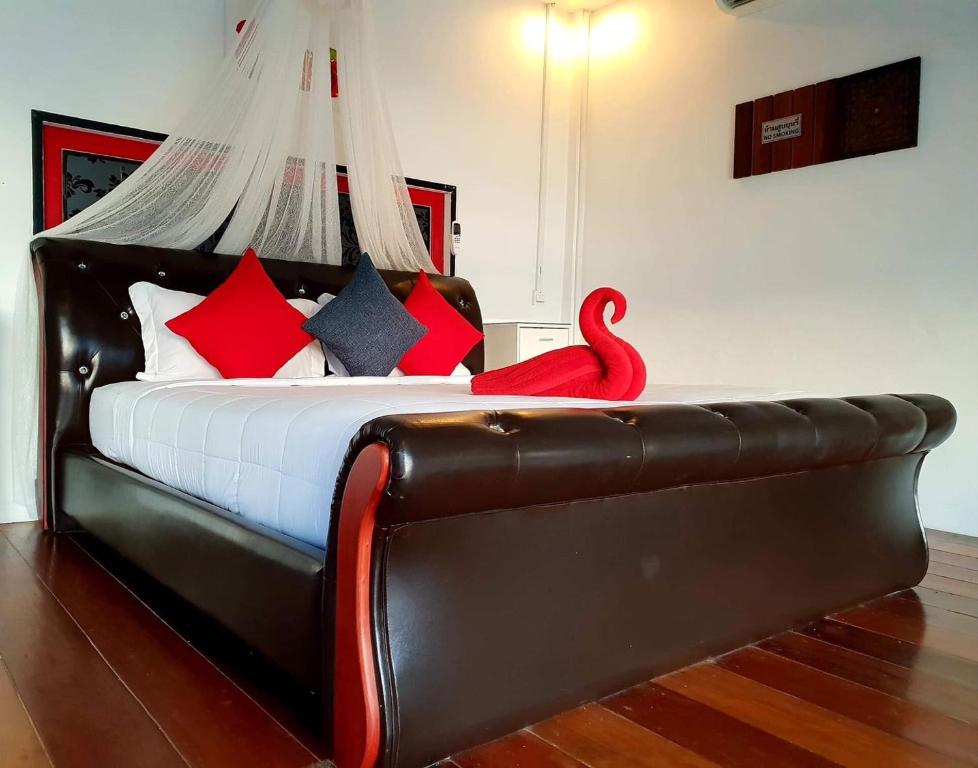 Postel nebo postele na pokoji v ubytování Phangan Cove Beach Resort