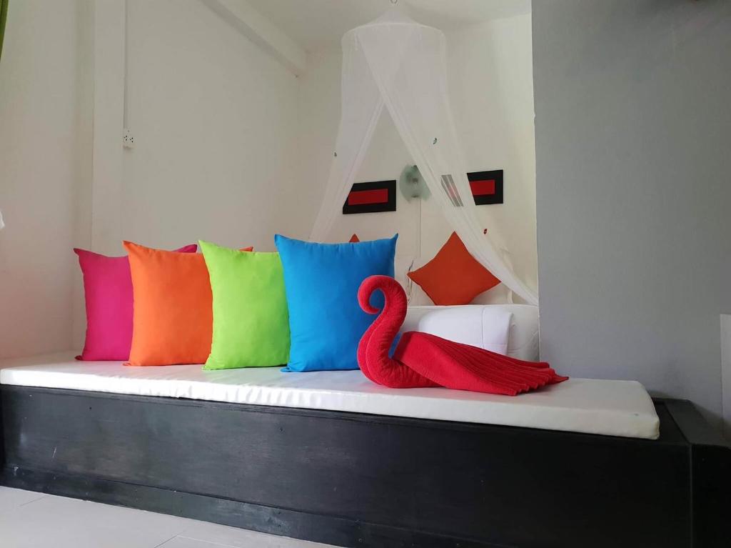 Postel nebo postele na pokoji v ubytování Phangan Cove Beach Resort