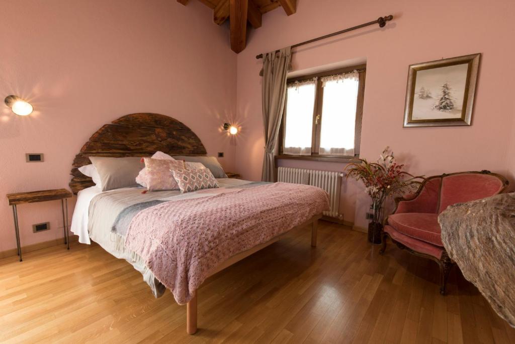 Postel nebo postele na pokoji v ubytování Le Jasmin