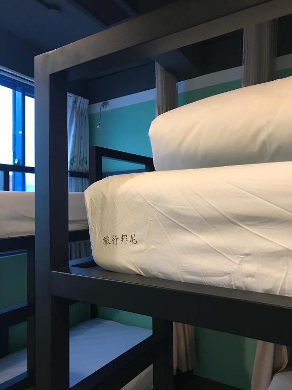 Postel nebo postele na pokoji v ubytování Tourist Bunny Hostel
