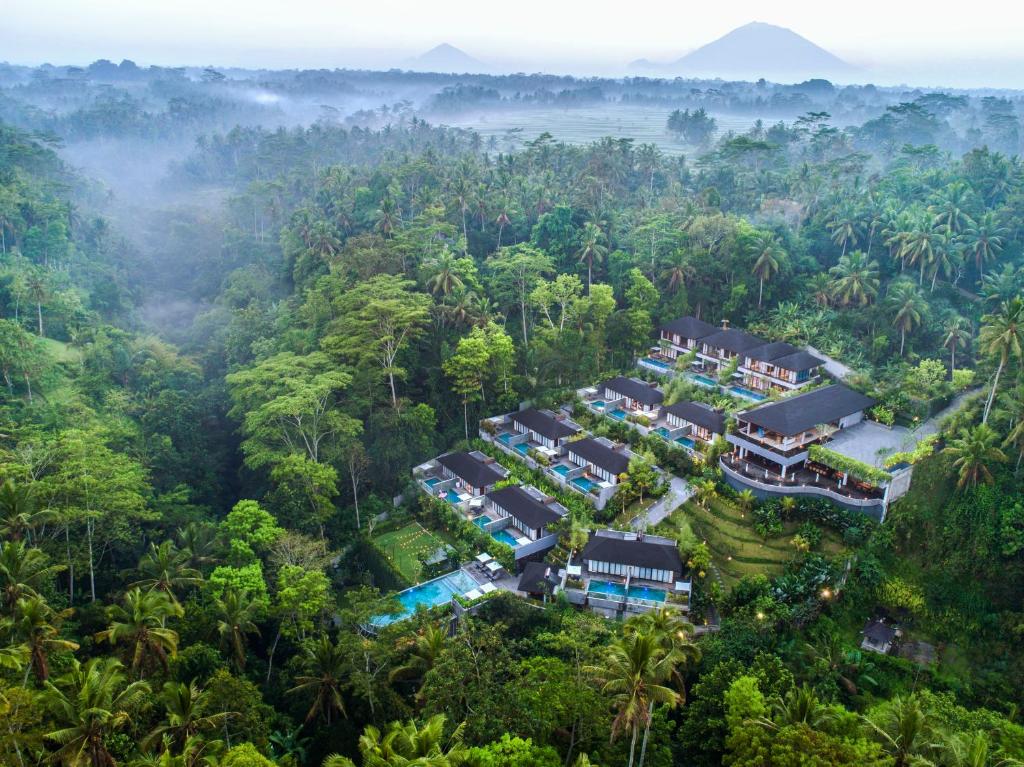 an aerial view of a resort in the jungle at Samsara Ubud in Ubud