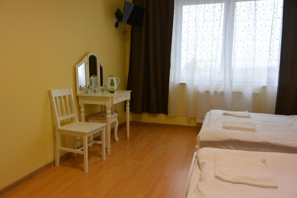 Posteľ alebo postele v izbe v ubytovaní Hostel DV Morski - z prywatnymi łazienkami
