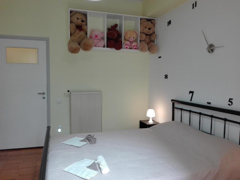 Łóżko lub łóżka w pokoju w obiekcie Athens Home 2