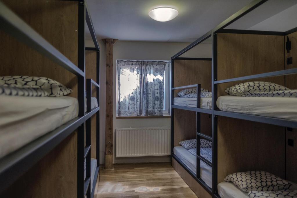 Postel nebo postele na pokoji v ubytování Onefam Míru