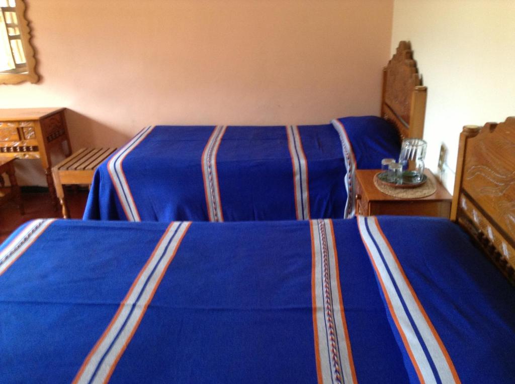 Postel nebo postele na pokoji v ubytování Posada de la Salud