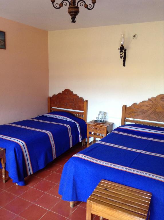 Postel nebo postele na pokoji v ubytování Posada de la Salud