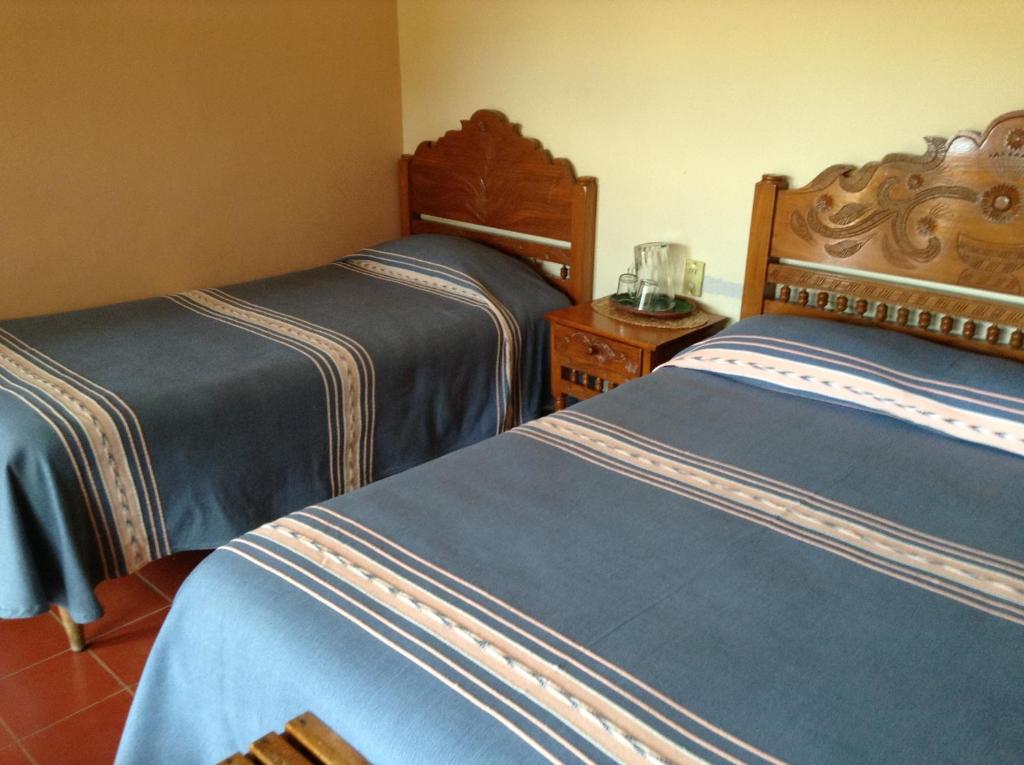 Postel nebo postele na pokoji v ubytování Posada de la Salud