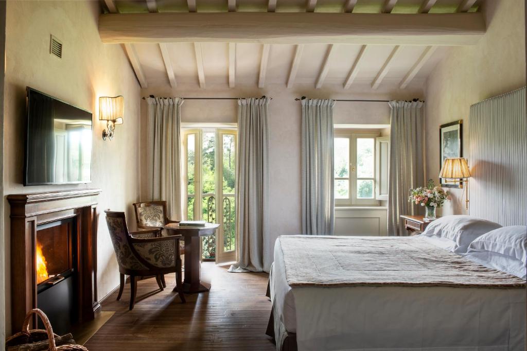 Łóżko lub łóżka w pokoju w obiekcie Il Borro Relais & Châteaux