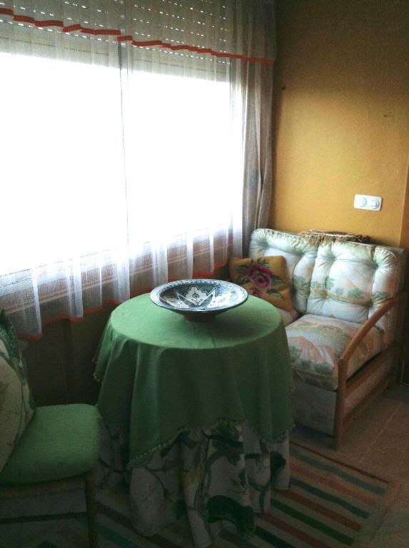 Posedenie v ubytovaní APARTAMENTO 10 PISO VISTAS AL MAR