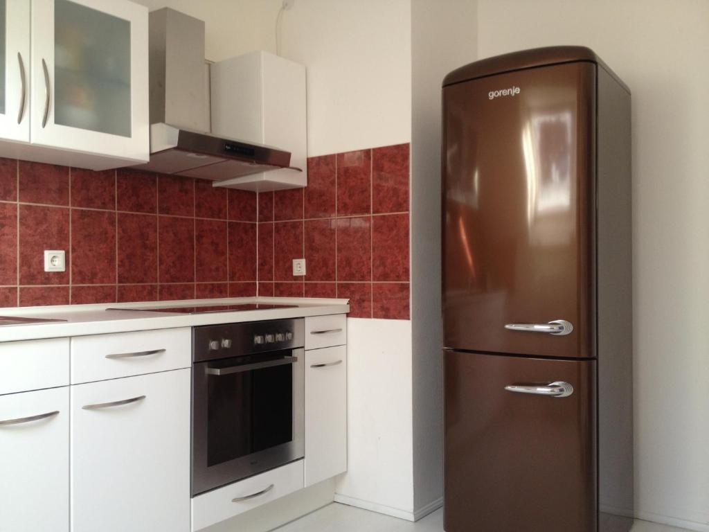 Kuchyň nebo kuchyňský kout v ubytování Apartment Hildesheim