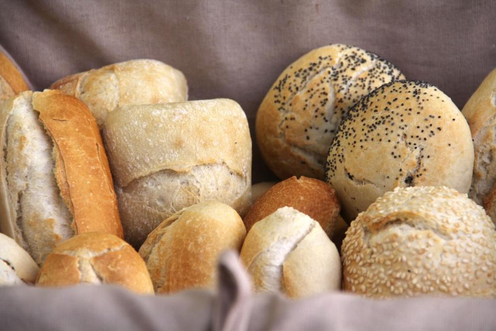 a bunch of different types of bread at Hotel Principe Paz in Santa Cruz de Tenerife