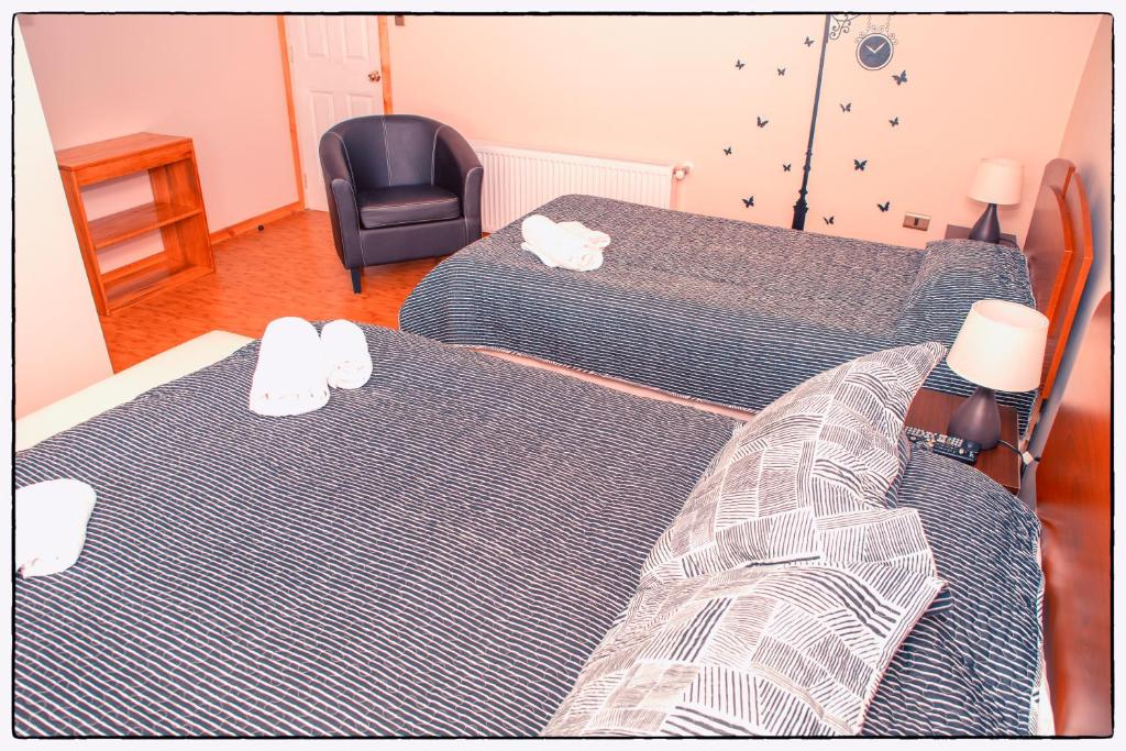 Postel nebo postele na pokoji v ubytování Hostal Los Teros