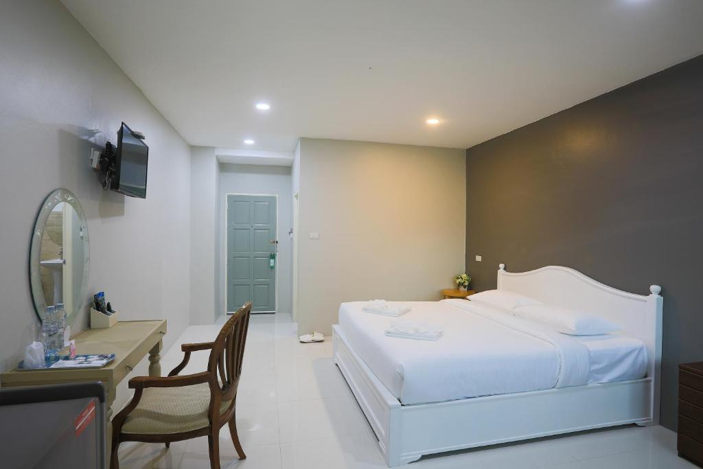 Postel nebo postele na pokoji v ubytování Phuket Nonnita Boutique Resort - SHA Plus