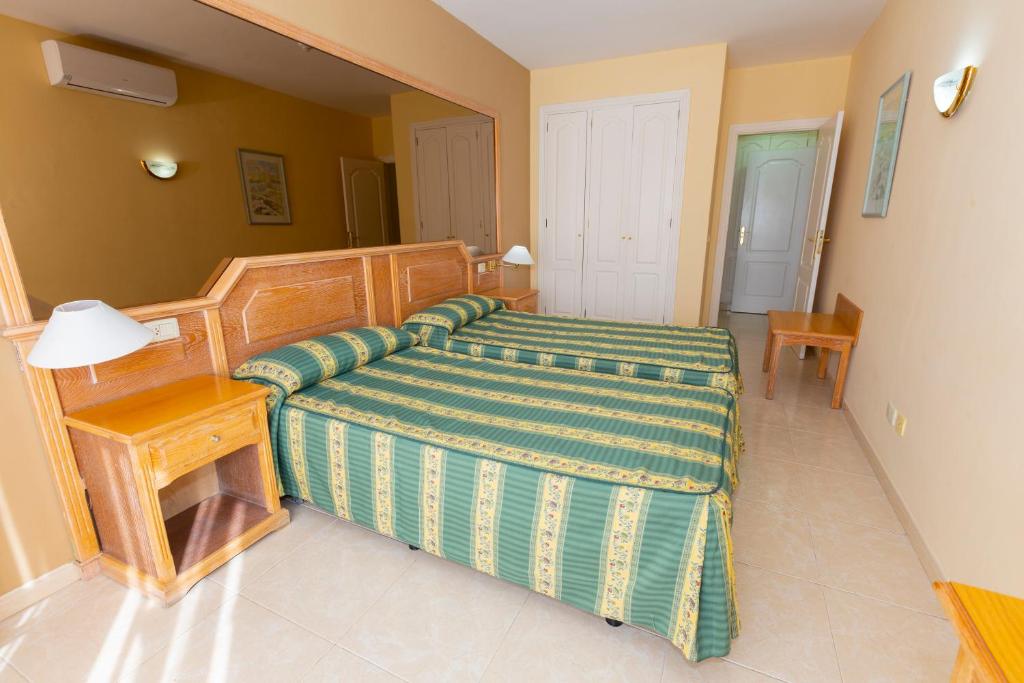 Posteľ alebo postele v izbe v ubytovaní Villa De Adeje Beach