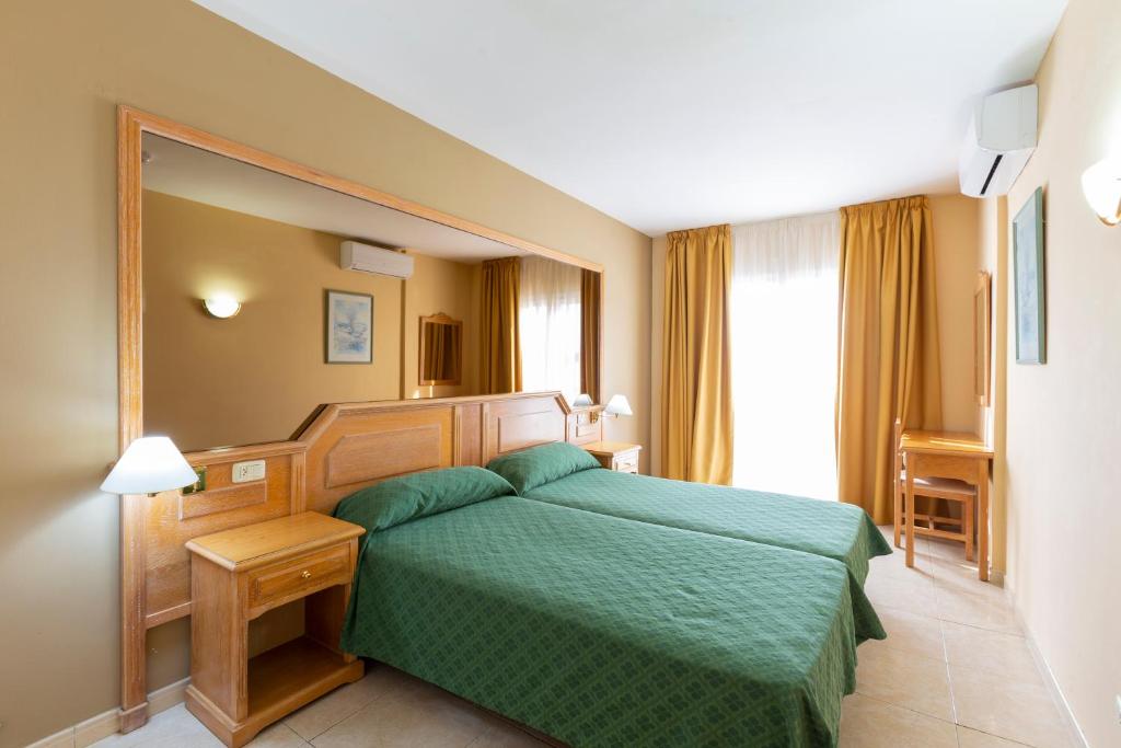 Posteľ alebo postele v izbe v ubytovaní Villa De Adeje Beach
