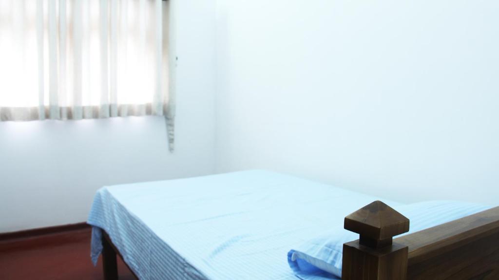 Postel nebo postele na pokoji v ubytování Grand Villa
