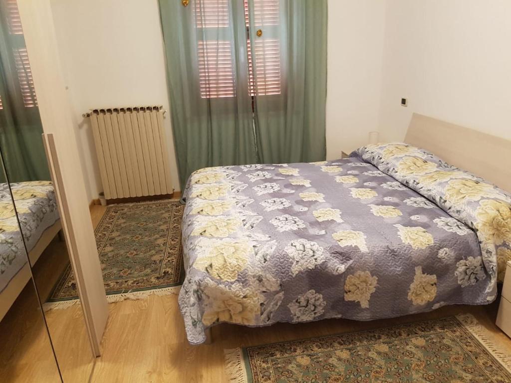 Postel nebo postele na pokoji v ubytování San Casciano