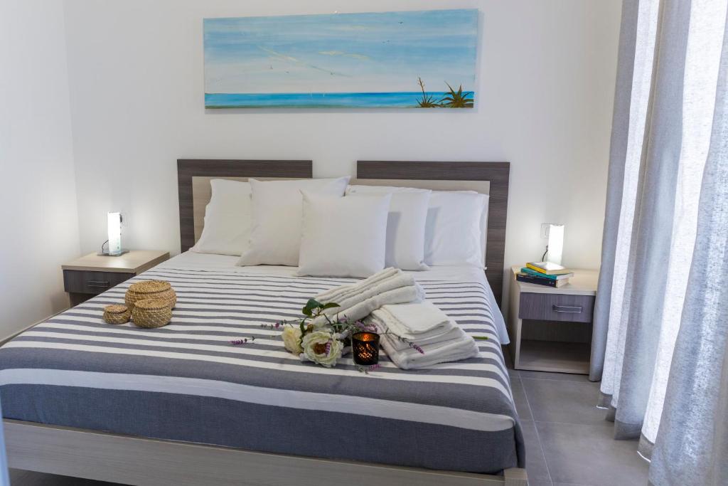 Katil atau katil-katil dalam bilik di MareinSicilia: Talia Residence